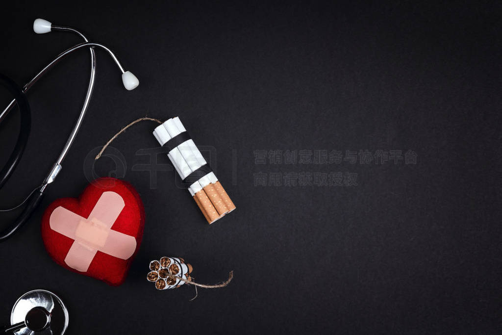 Stop smoking concept with cigarettes dynamite, stethoscope and