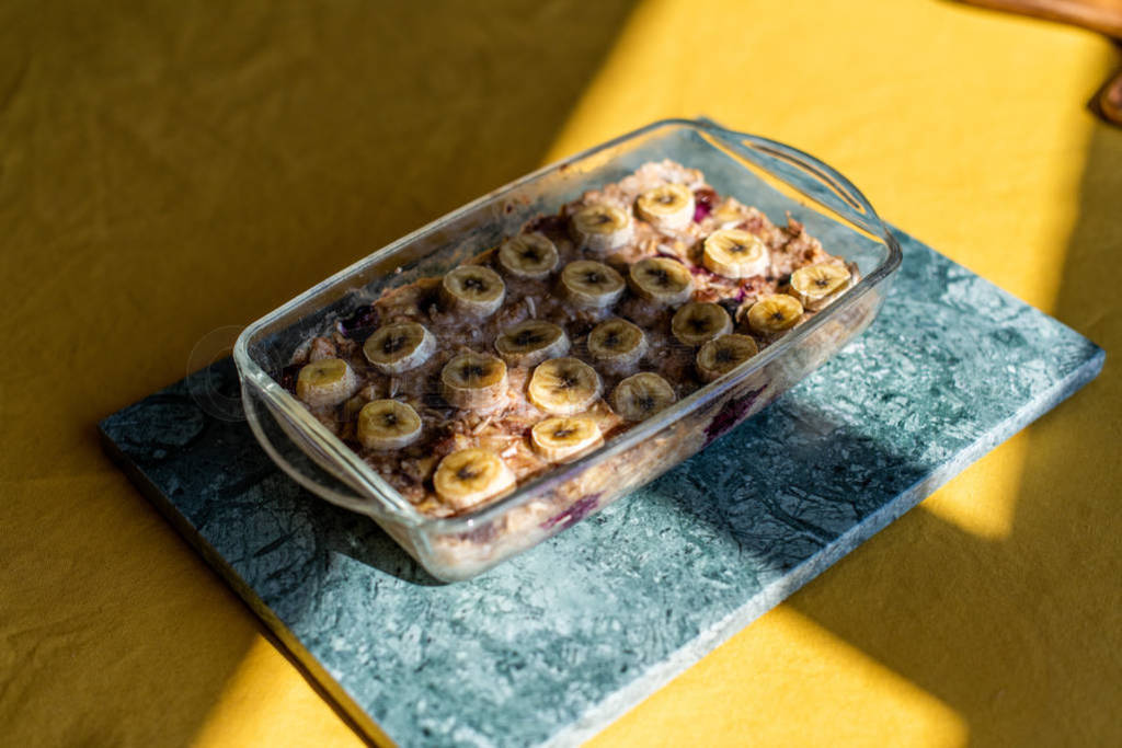 baked oatmeal with banana, blueberries, walnut and raisins.