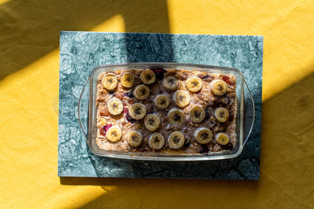 baked oatmeal with banana, blueberries, walnut and raisins.