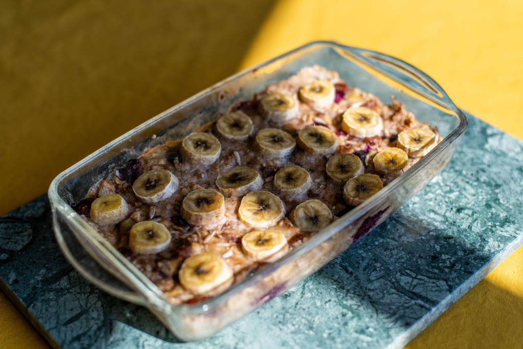 baked oatmeal with banana, blueberries, walnut and raisins.