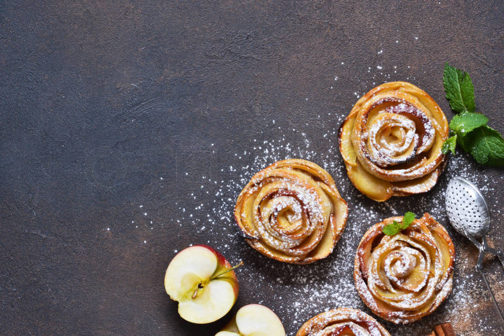 Dish of apple roses baked in puff pastry