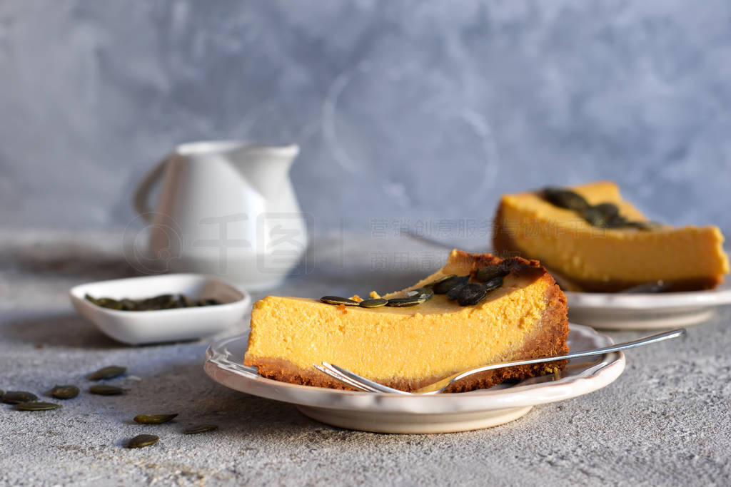 Slice of pumpkin cheesecake with seeds
