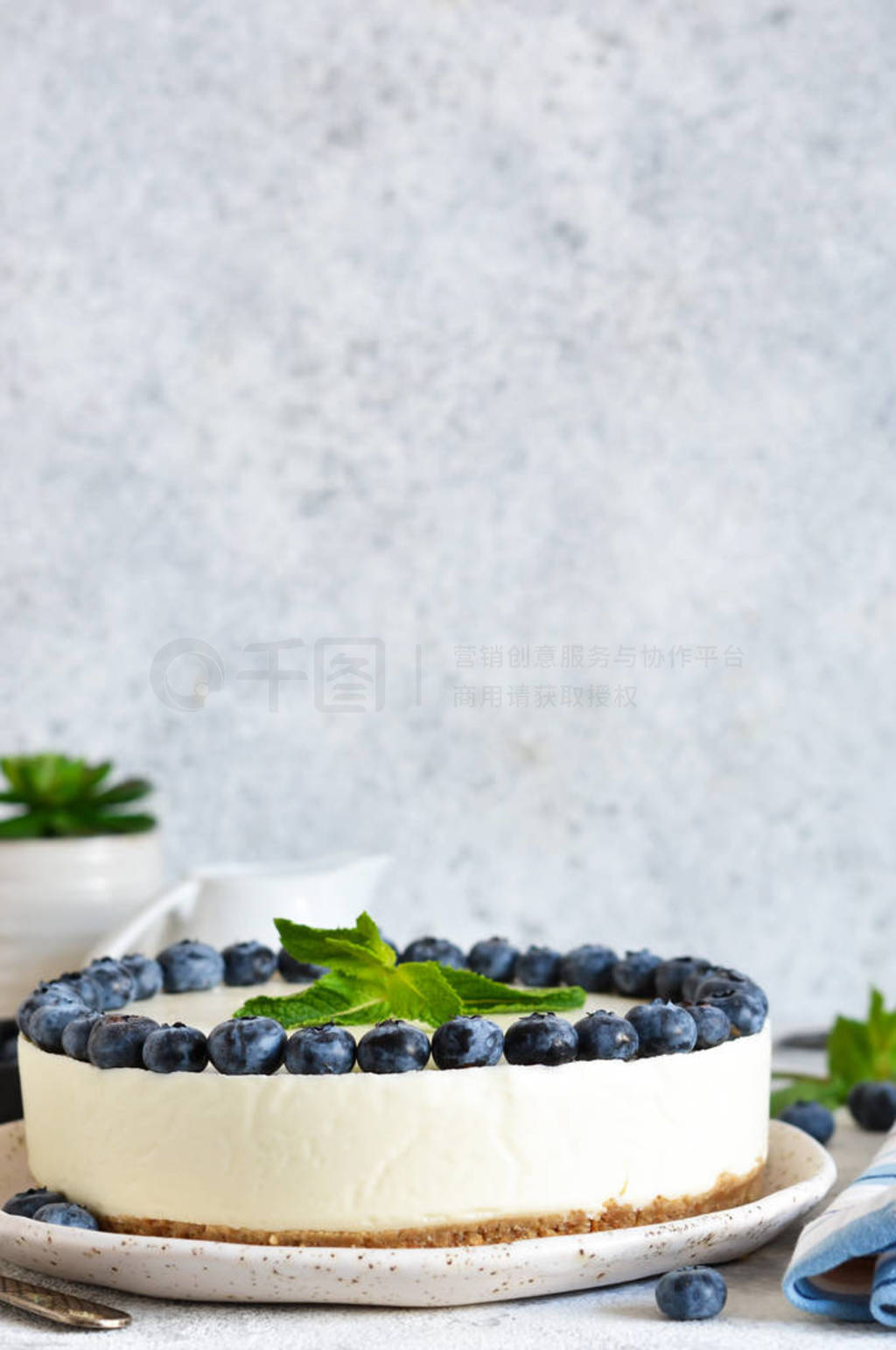 Classic blueberry cheesecake on the kitchen table.