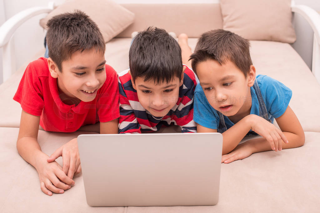 Children of different ages use gadgets for games, communication