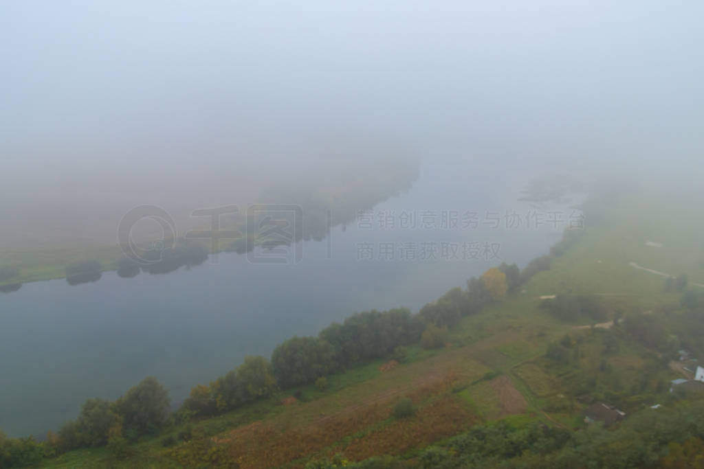 View of the Dniester river covered with a thick morning mist