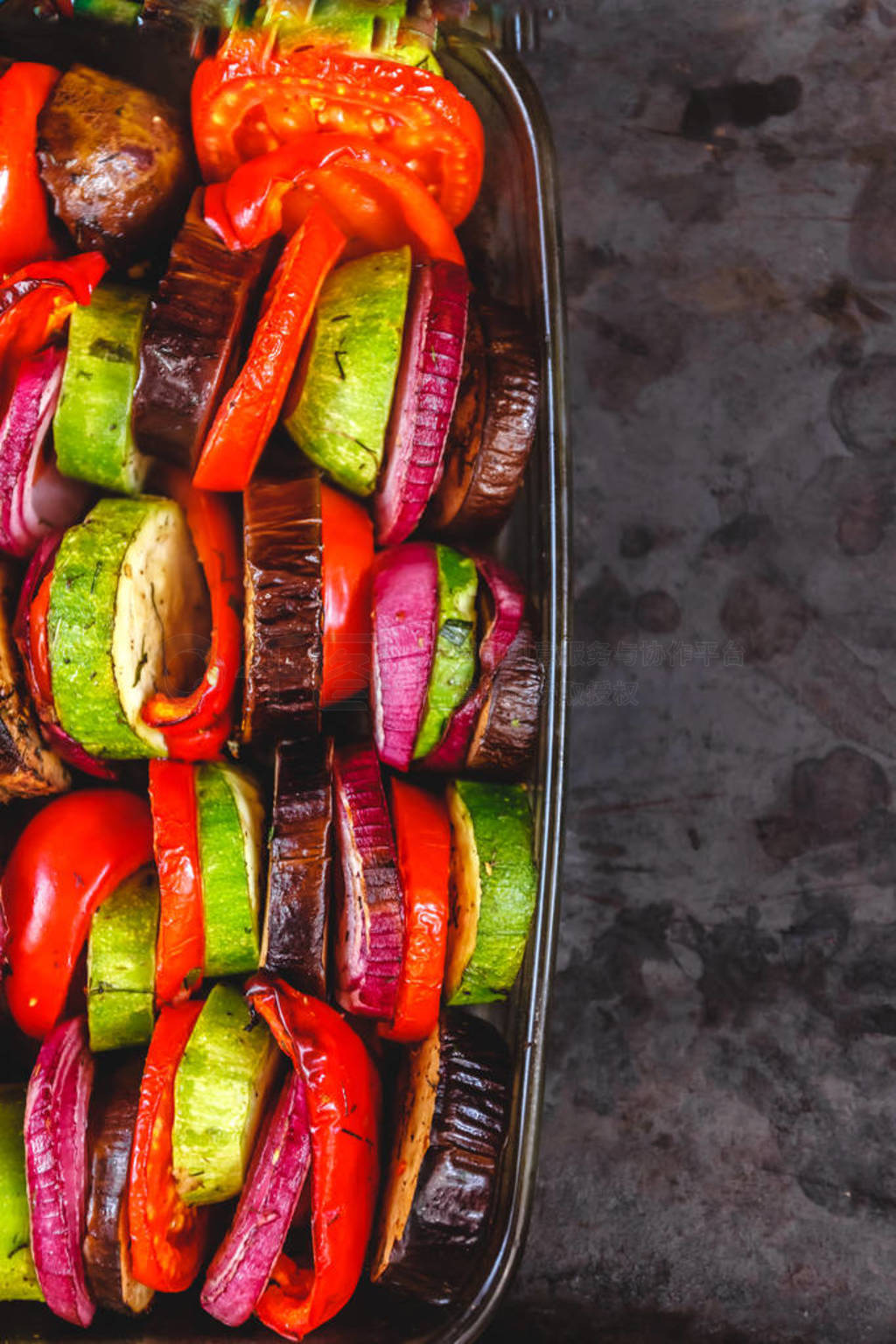 Assorted different bright and juicy baked vegetables, zucchini,