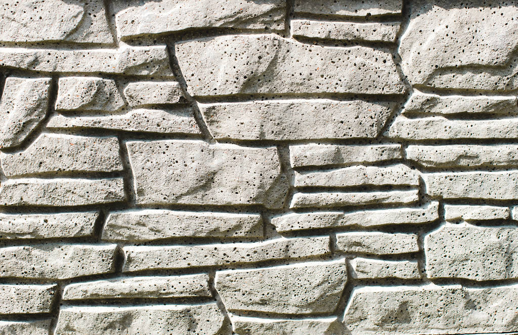 Abstract gray background of stone sandstone in a row
