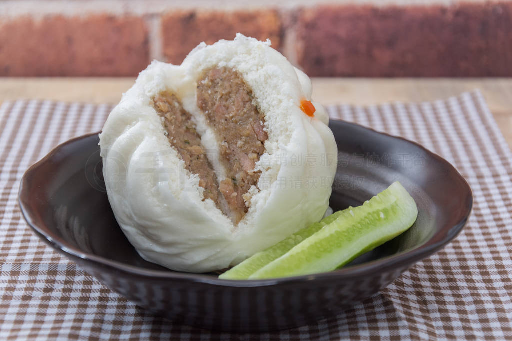 Chinese dim sum BBQ Pork Bun, Pandan pau or bao and cucumber in