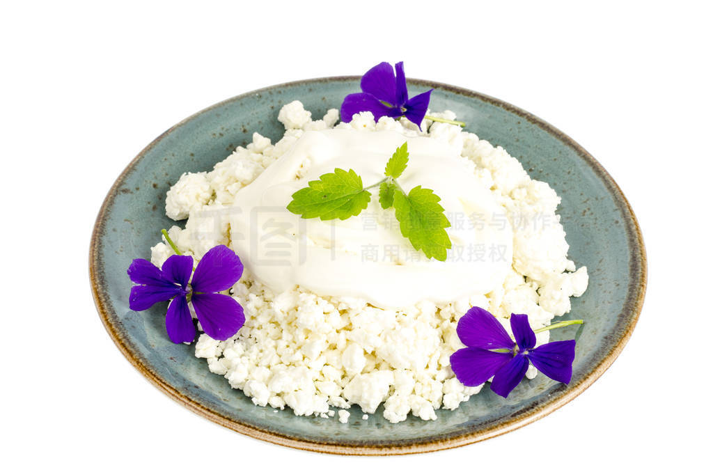 Blue plate with granulated cottage cheese.