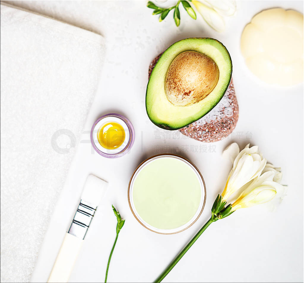 Beauty concept avocado skin care facial essence oil, soap, lily