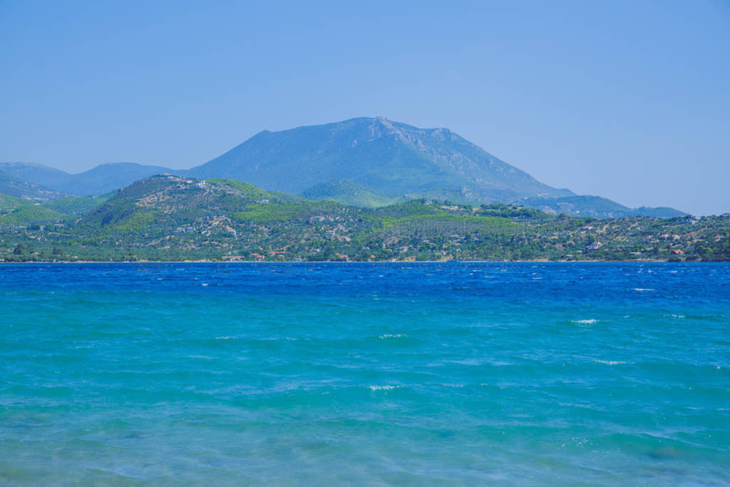 City Athens, Greek Republic. Beach and blue water. Green nature