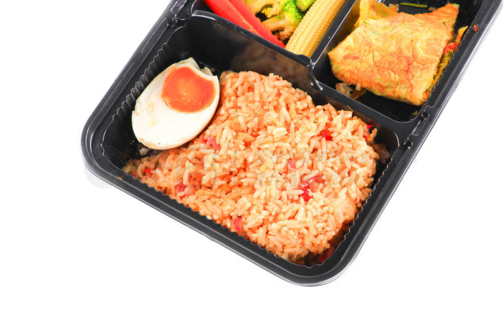 close up fried rice with egg and vegetables in lunch box set