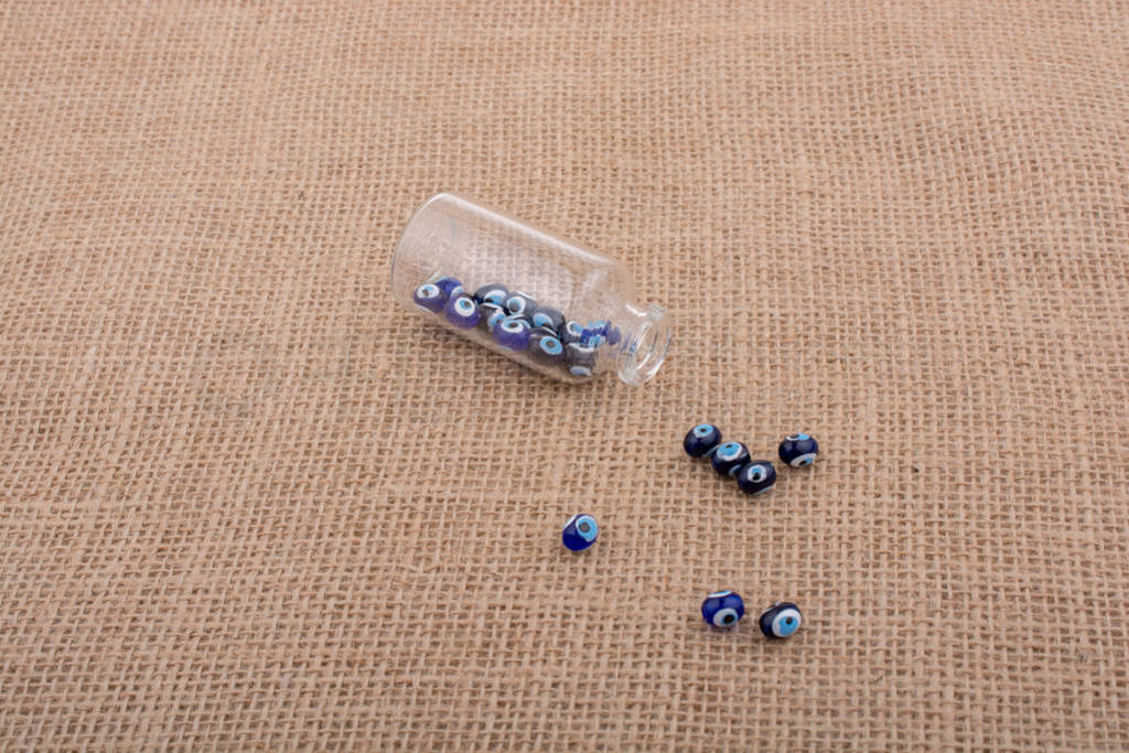 Evil eye bead in bottle as souvenir