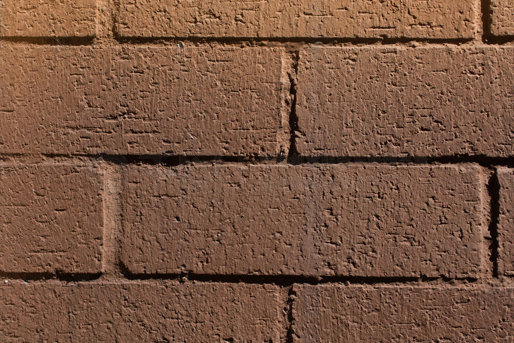 Weathered old grunge brick wall as background texture