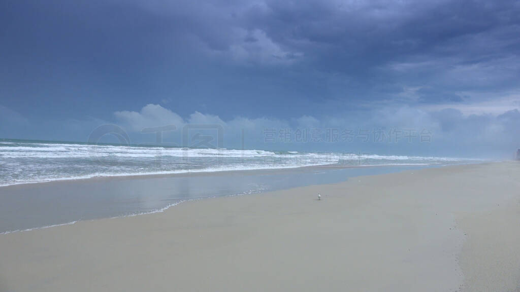 Empty sandy beach on a rainy day - Atlantic ocean - travel photo