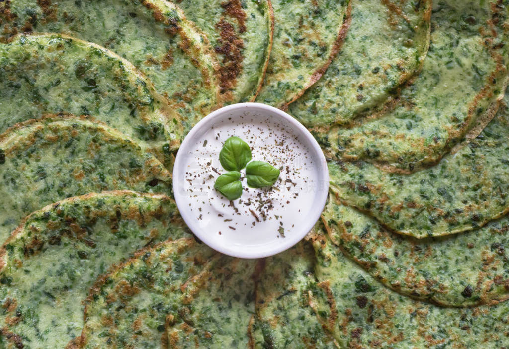 Close up green spinach pancakes. Top view.