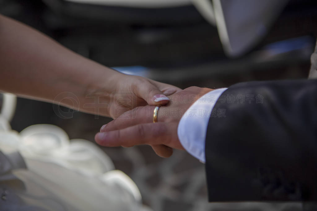 exchange of wedding rings by the priest prelate bishop