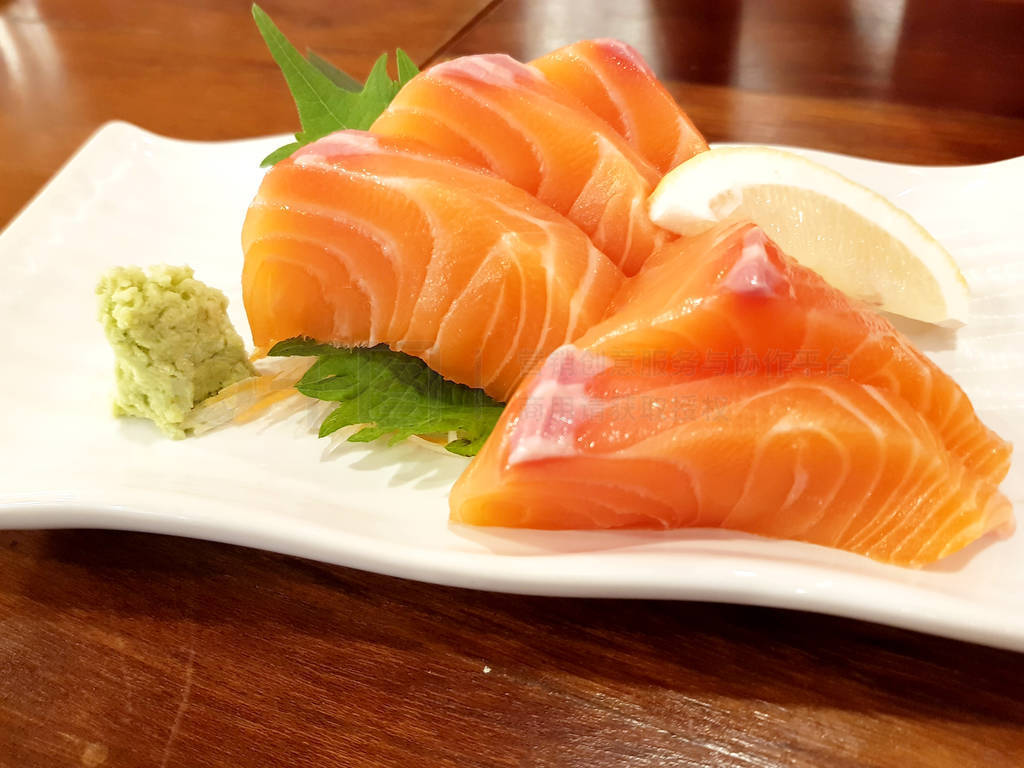 Fresh salmon sashimi with wasabi