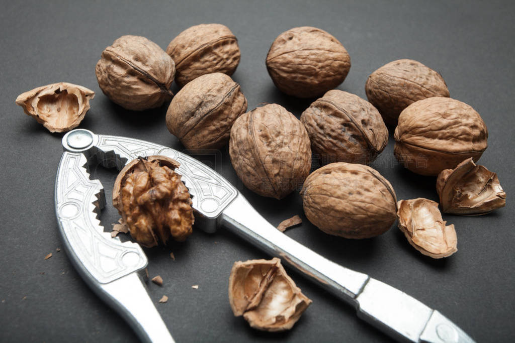 Healthy lifestyle. Organic walnuts with a broken shell, kernels