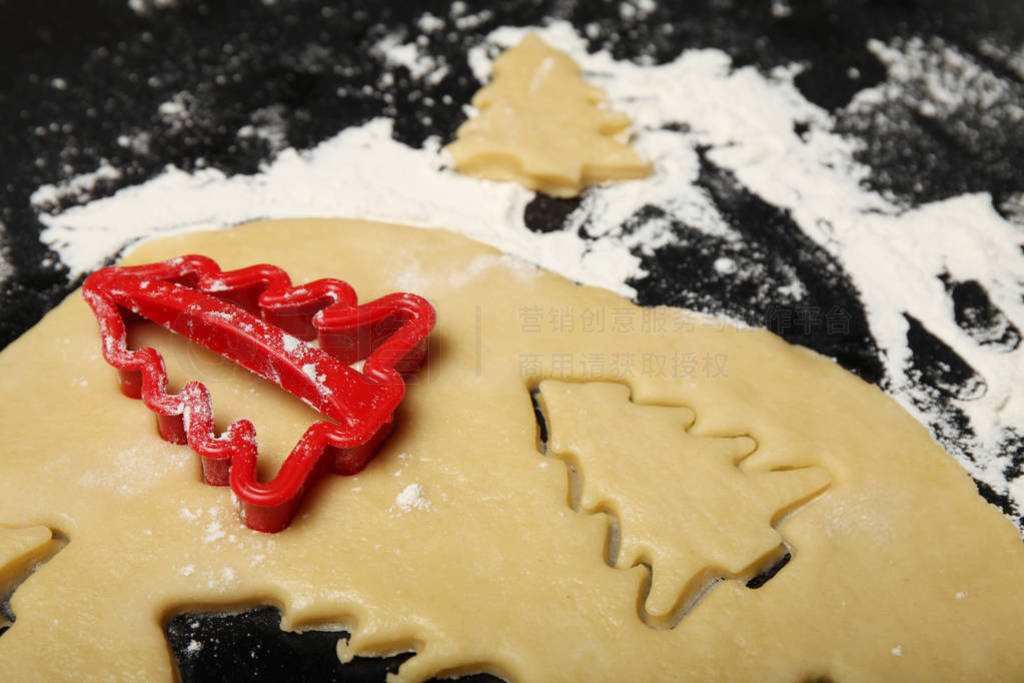 Sweet dough in fir form. Homemade Christmas dessert.