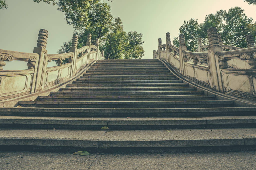 Empty wide stairs of marble bridge on Shan Lake in Guilin
