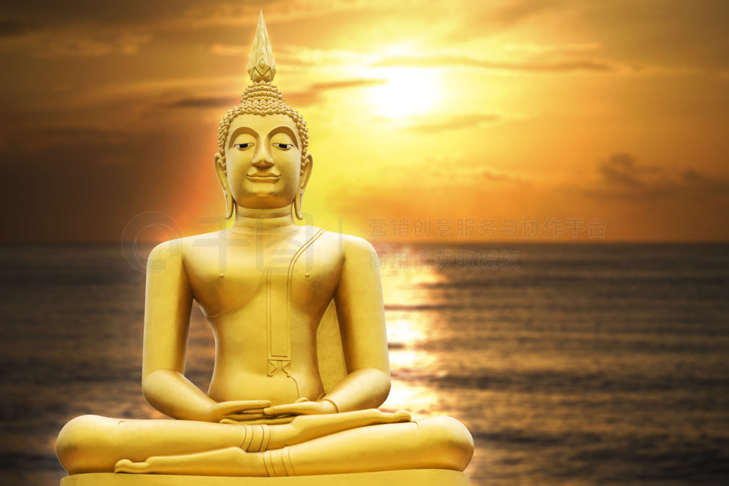 Gold image of Buddha in Blurred sunrise or sunset moment , with