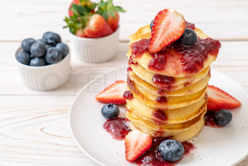 pancake with strawberries and blueberries