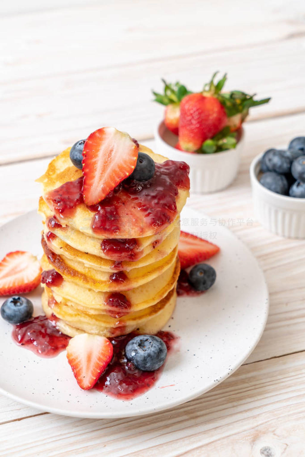 pancake with strawberries and blueberries