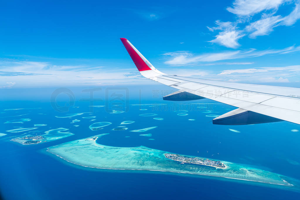 Maldives islands top view from airplane window