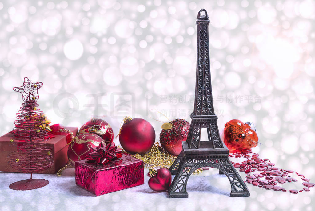 Christmas holiday in Paris concept. The Eiffel tower and red chr