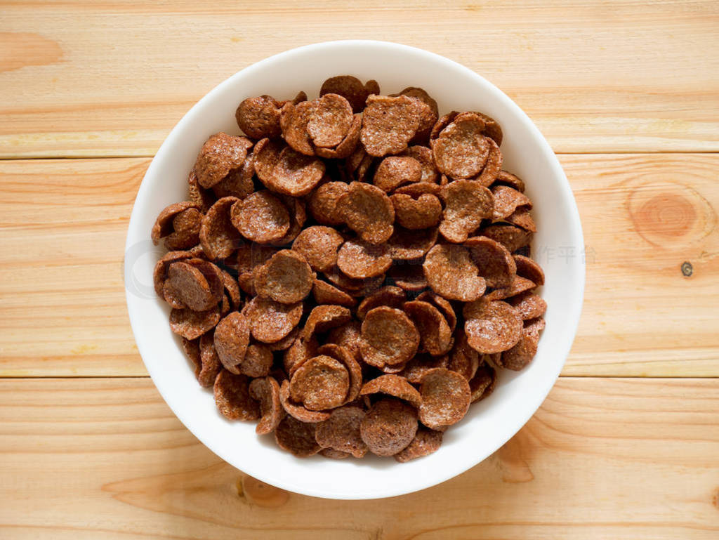 Chocolate breakfast cereal in a white bowl