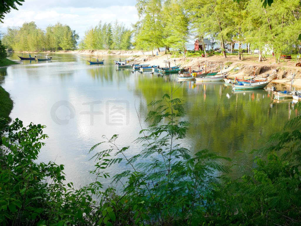 Local boats parked in fishing harbor