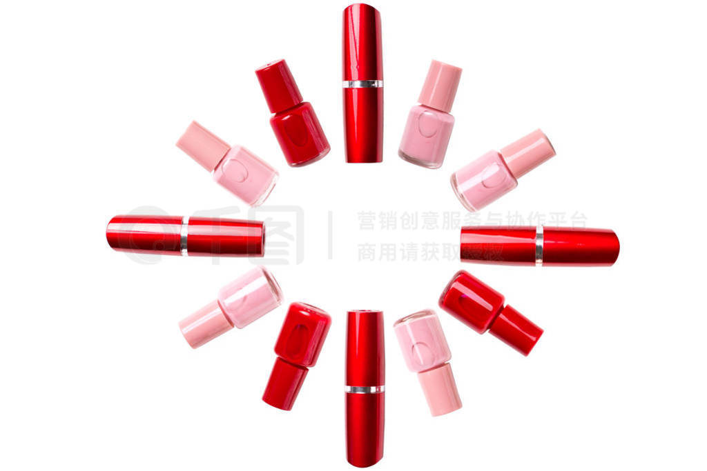 Red lipstick and nail polish on a white background. Isolated pat