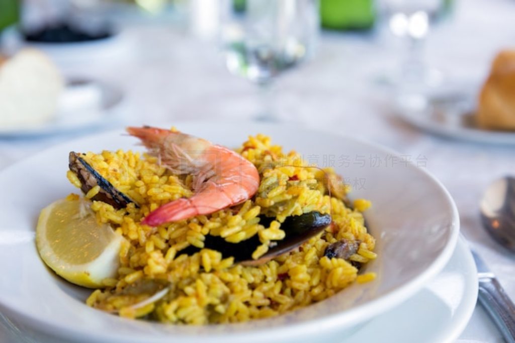 ͳʷ Paella