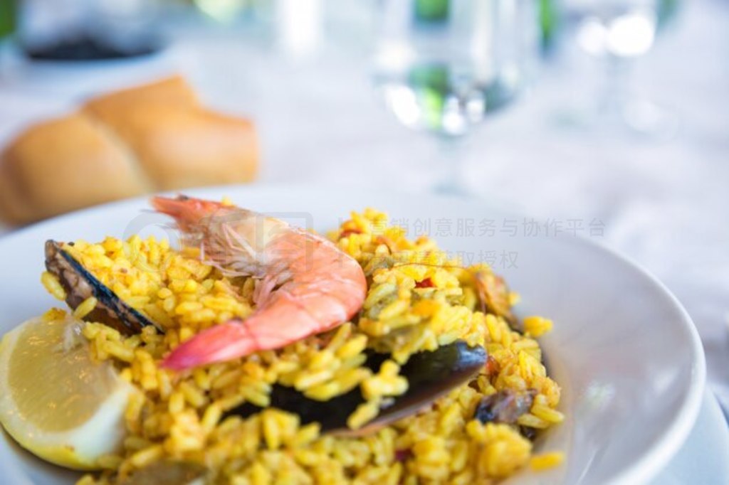 ͳʷ Paella