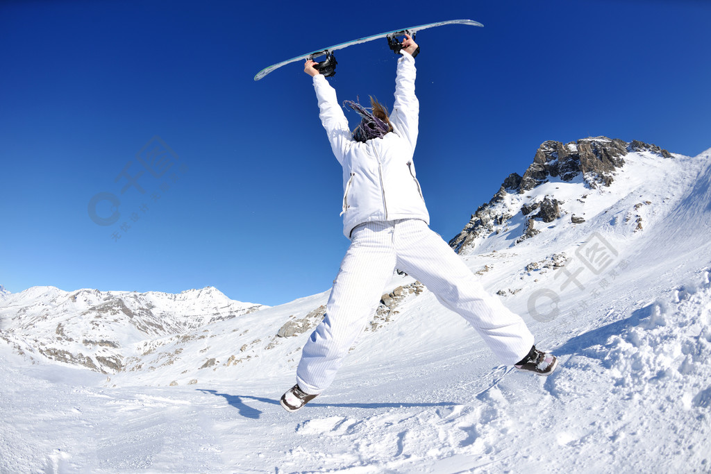 冬季女人滑雪运动乐趣旅行雪板