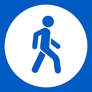 蓝色行人交通标志图片