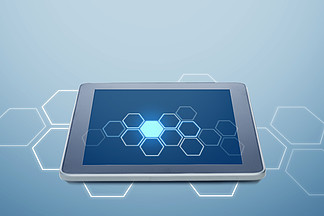 网络和现代电子产品的概念— —具有单元格模式的平板电脑在蓝色背景