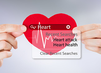 女手牵心和心跳符号与搜索引擎和心脏病发作标志