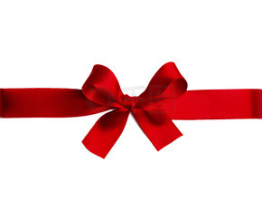 发光的红色缎丝带和孤立的白色背景上的蝴蝶结节日礼物的概念闪亮的红色缎带蝴蝶结