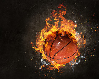 在黑暗中背景上的火球的球混合媒体篮球比赛概念