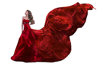 女人时尚红色衣服，挥舞着在风上飞绸礼服
