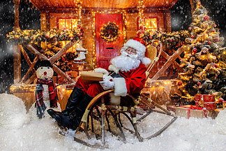 Santa Claus <i>is</i> preparing for Chr<i>is</i>tmas. He writes letters. House of Santa Claus. Chr<i>is</i>tmas decoratio